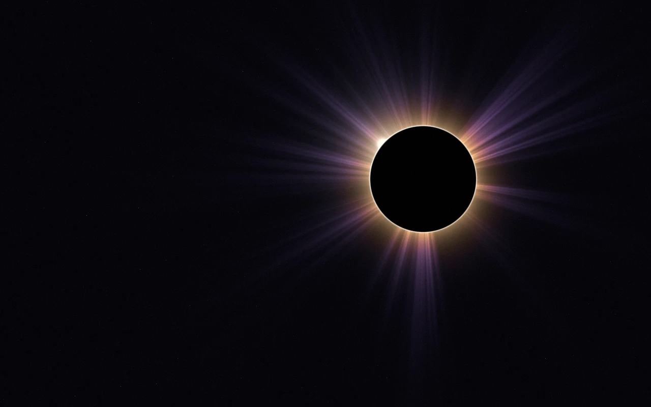 Still frame of Eclipse: a total eclipse with a diamond-ring bead and a slowly turning corona